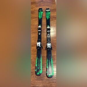 Monster skis with bindings.